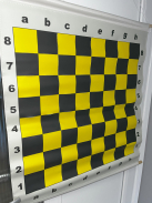 Roll-up pocketed demonstration chessboard